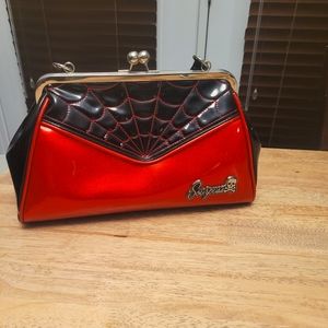 Sourpuss spider web purse